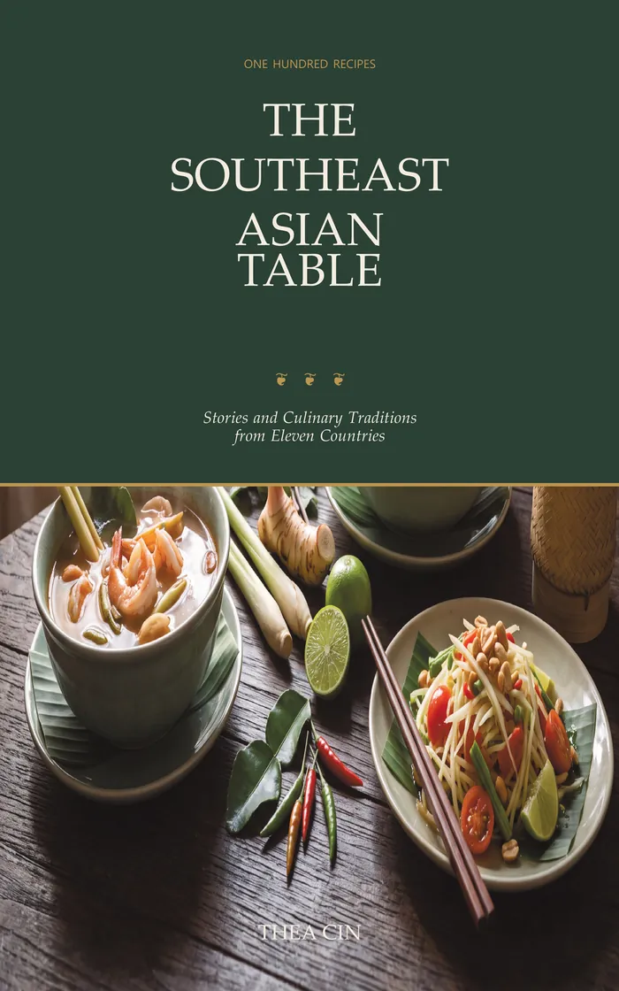 The Southeast Asian Table, front cover: a laid table of dishes from across the region.